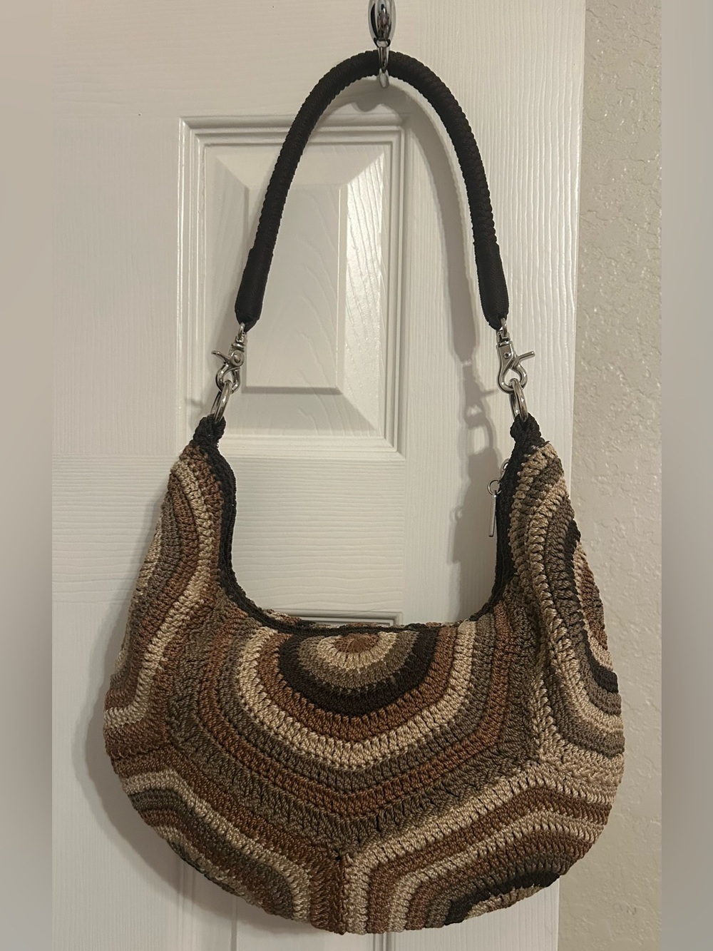 The Sak Crochet Hobo Bag in Brown and Cream Tones